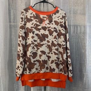 Oversized cow print sweater